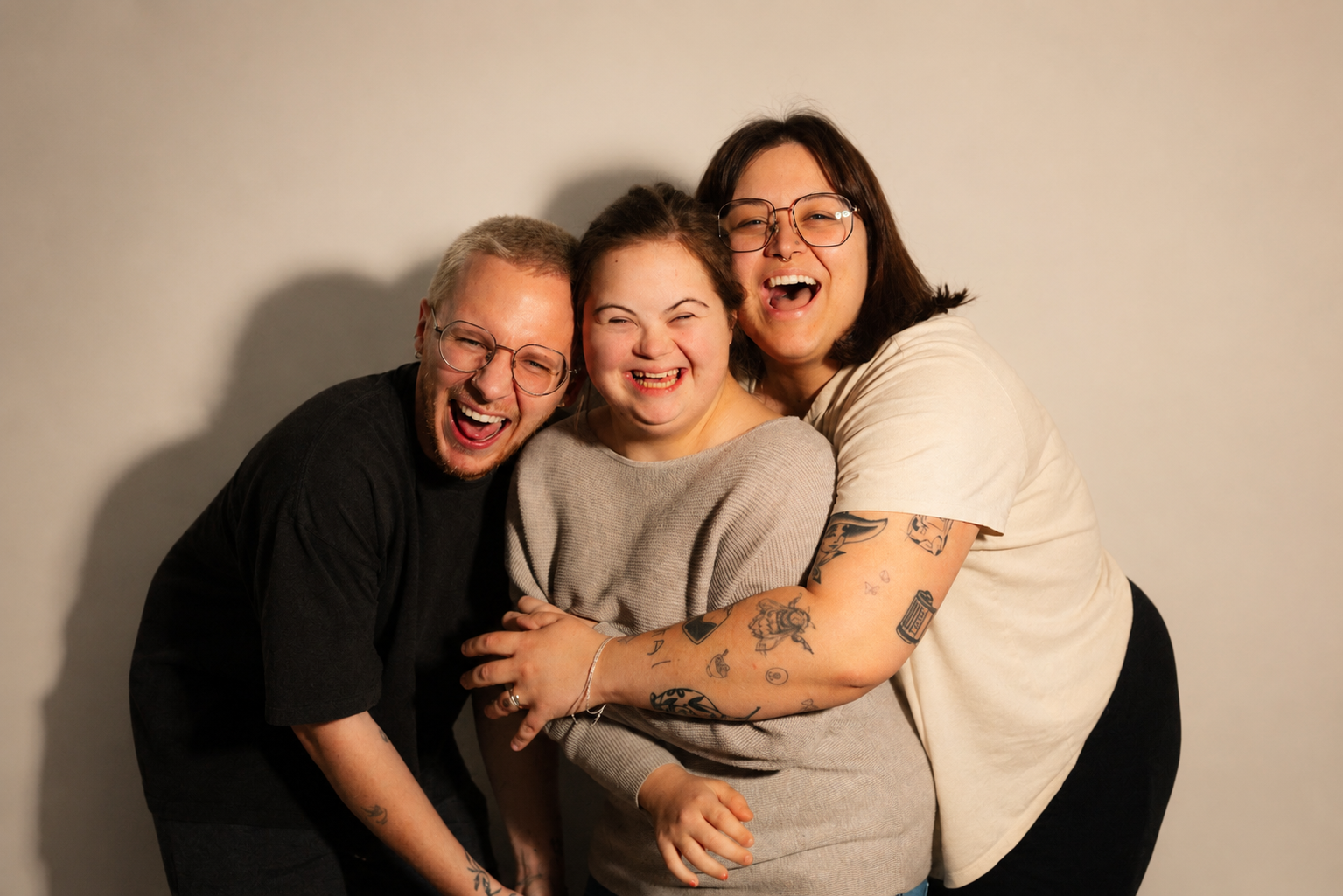 Mother embracing daughter with Down syndrome outdoors
